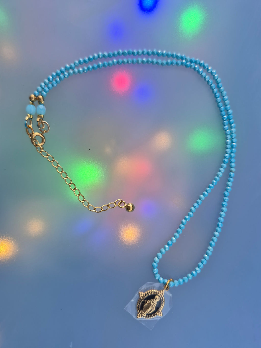 Collier: Perles turquoise zirconium et pendentif