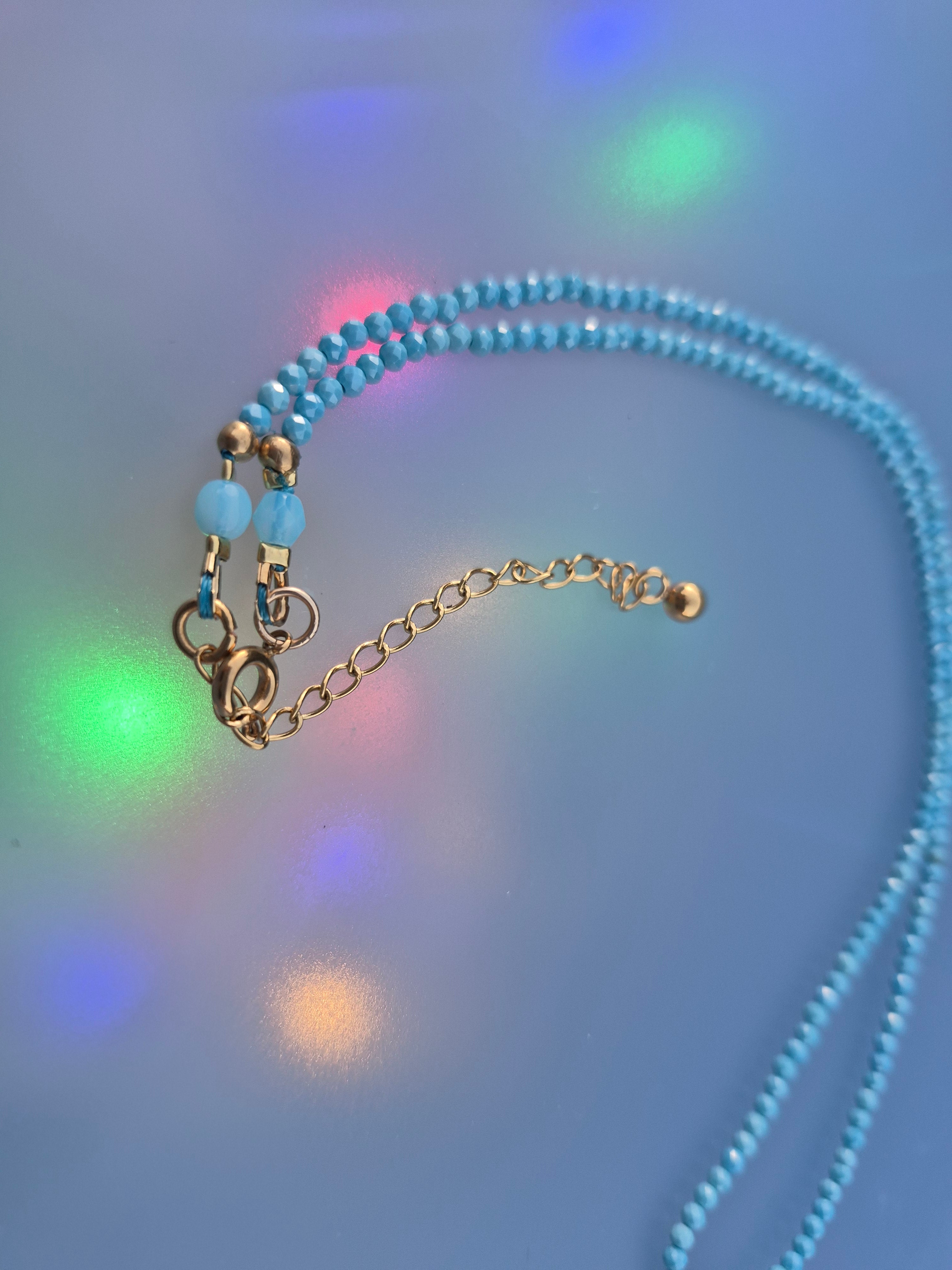 Collier: Perles turquoise zirconium et pendentif